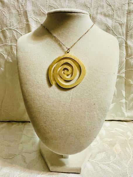 Brass Gold Swirl on an 18 Inch Gold Chain With Extender